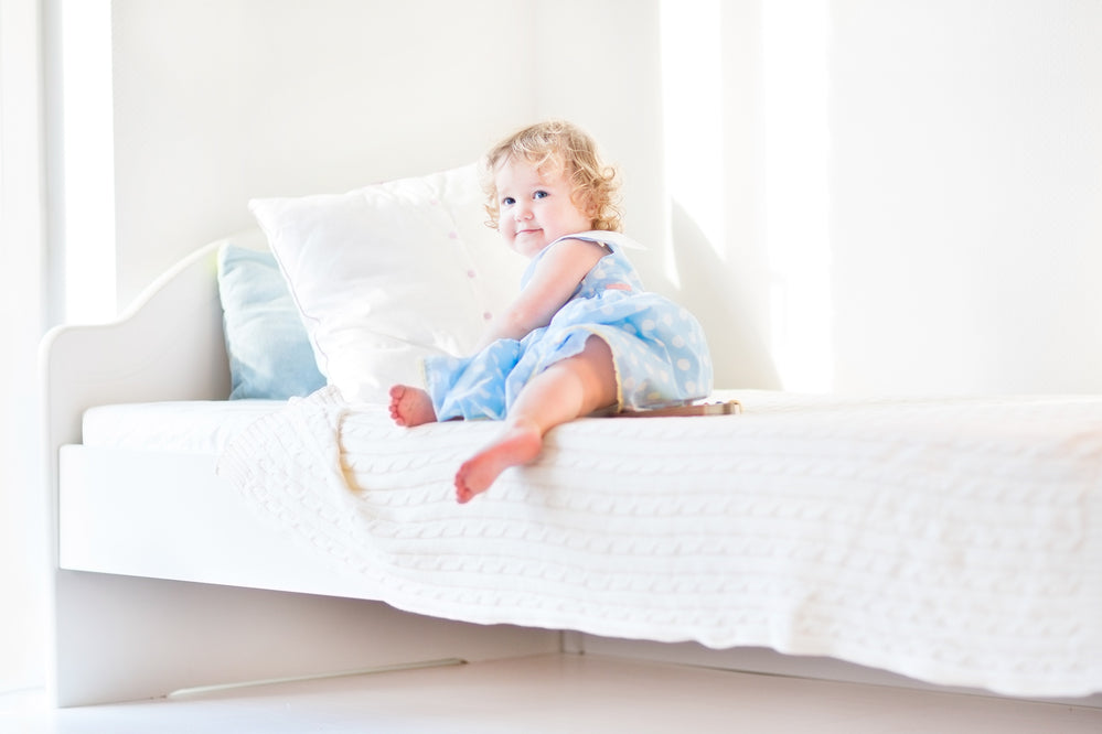 Convert baby bed to toddler bed on sale