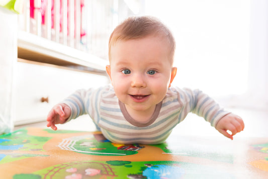 Baby doing tummy time on the floor