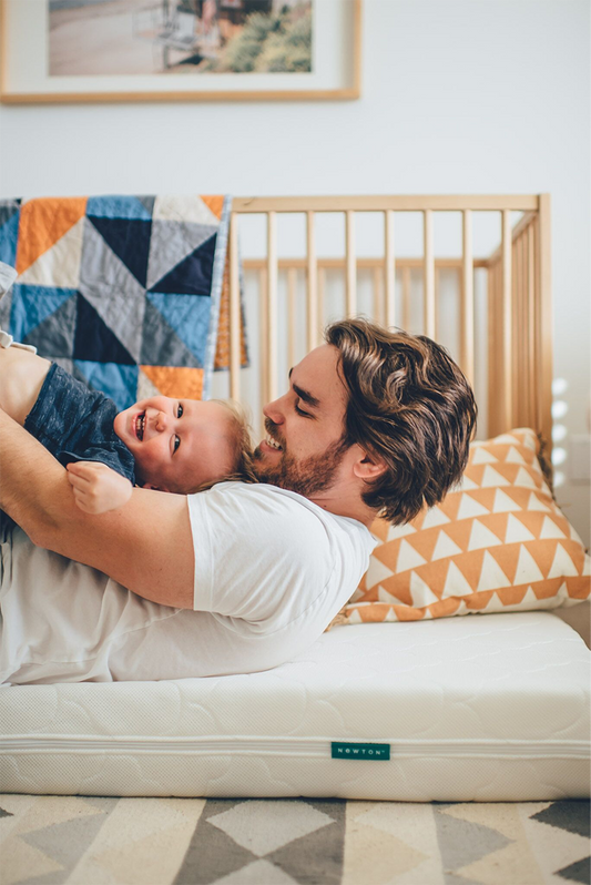 Dad holding baby boy