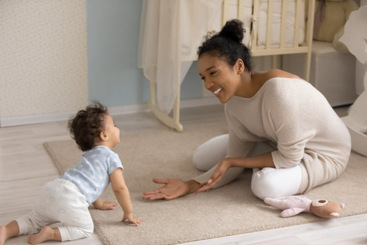 Mom with child after babyproofing