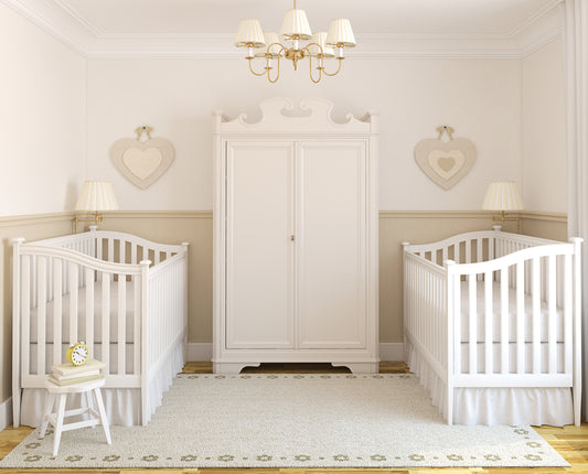 Two cribs or twins on opposite sides of nursery