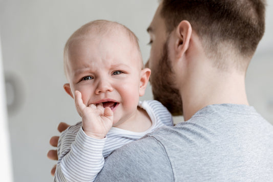 dad soothing fussy baby