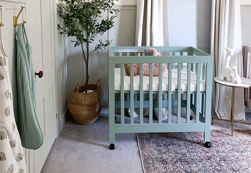 Green mini crib online